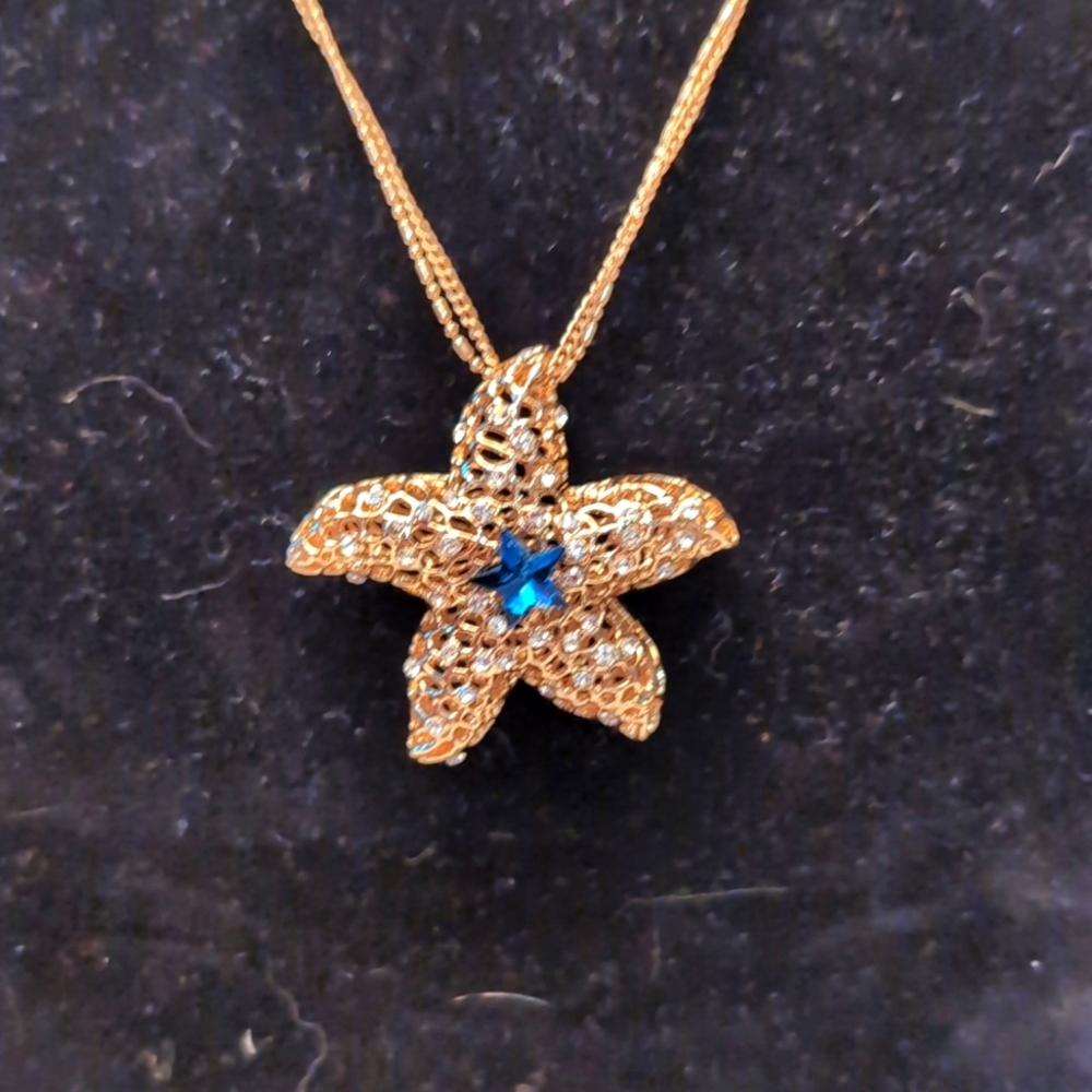 Gold Toned Starfish Multi Strand Necklace With White and Blue Stones